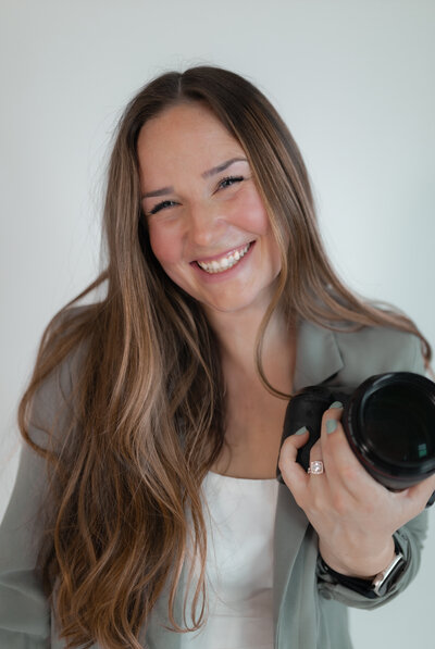 Lexi Hungerford holding camera