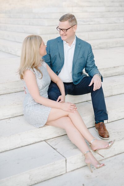 Bride and groom walk up memorial steps at their DC wedding