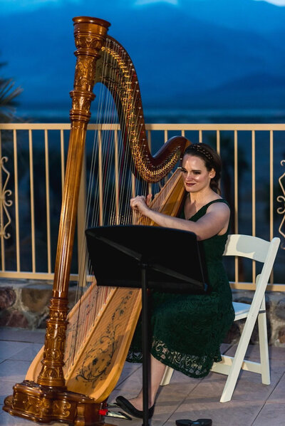 Harpist playing for an Oasis at Death Valley wedding cocktail hour