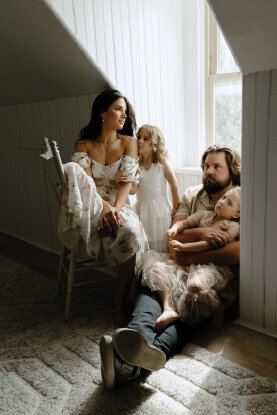 family-posing-in-attic