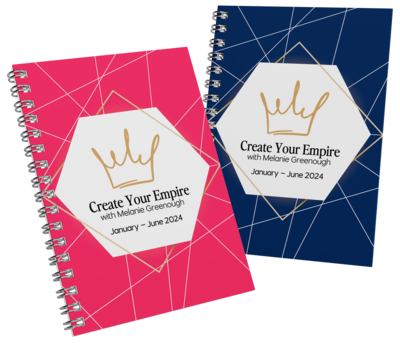 Notebooks with "create your empire" on the cover