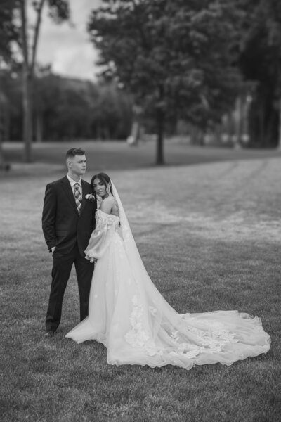 Eagle Oaks Golf Club | Bride and groom on fairway during summer wedding portrait | Farmingdale, New Jersey