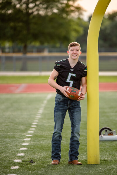 High school grad photography on football field