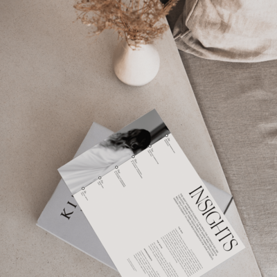 Brand guidelines paper on table