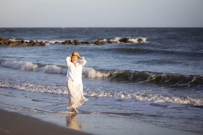 Tamma walking down the beach