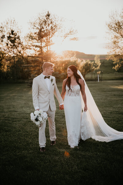Wedding photography at Venue Twenty5 in Mandan, ND, capturing beautiful moments with a blend of elegant indoor and outdoor settings, perfect for a memorable wedding day.