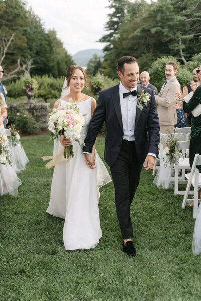 Manchester Country Club - Couple Walking Down Their Outdoor Wedding Aisle