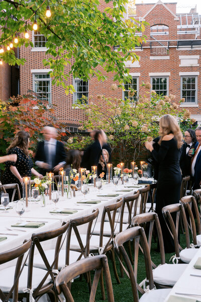 Bright floral centerpieces mixed with colorful fruit at Glen Foerd Estate in Philadelphia, PA
