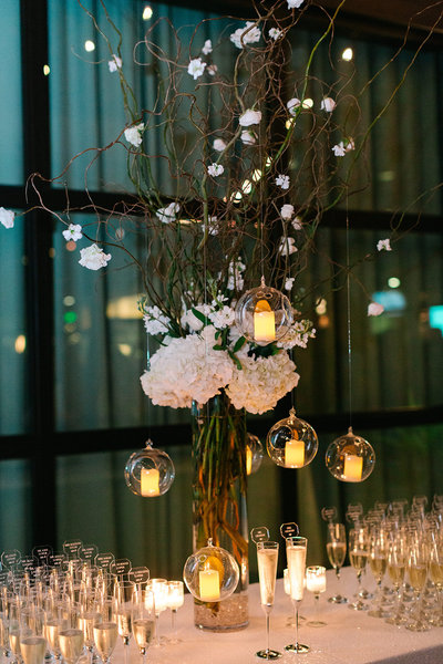 Armature works. escort cards. Champagne flute escort cards. white sequin linens. over the top linens. kate spade champagne flutes. tampa wedding planners. tampa videographer. tampa wedding florist.