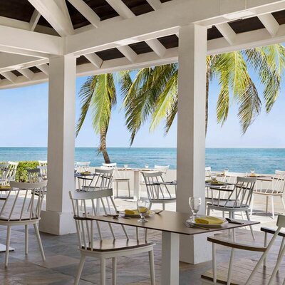 outdoor dining area of beach front hotel