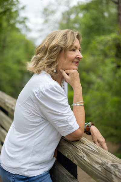 Woman looking out over bridge