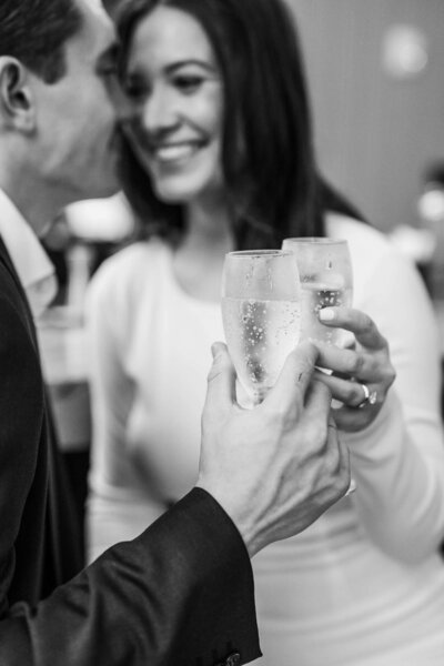 Romantic wedding toast with sparkling champagne. A timeless moment by Jackson Ms Wedding Photographer.
