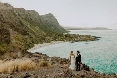 bride & groom sitting at horseshoe