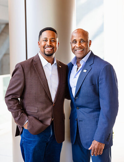 Two men posing for Corps Capital Energy Investments headshots at Kimpton Claret Hotel in Denver Tech Center