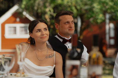 Bride and groom getting emotional at speeches  during their wedding at Caleb Pike in Victoria by Latitude 49 Photography