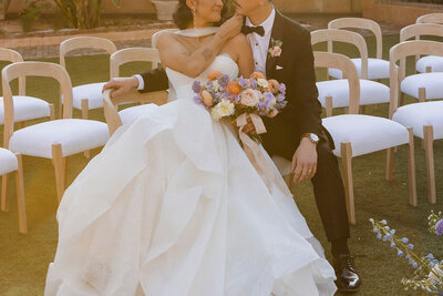 bride and groom embrace after wedding ceremony in arizona
