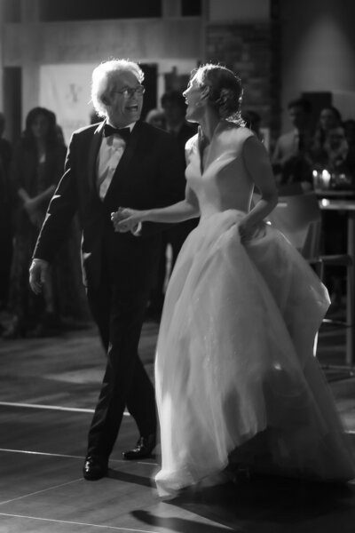 father leads bride to dance floor at Alpine Ski Club wedding