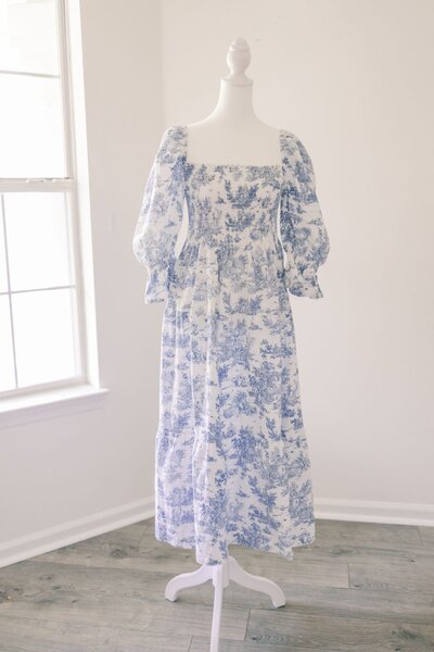 Women's white and blue floral dress.