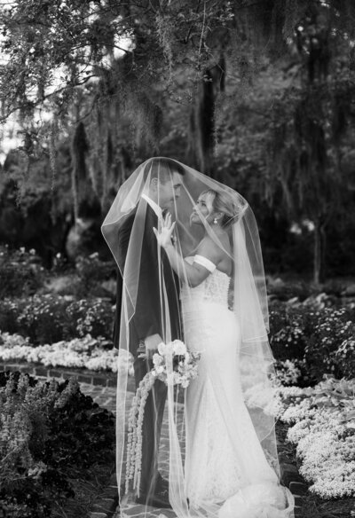 groom dipping bride