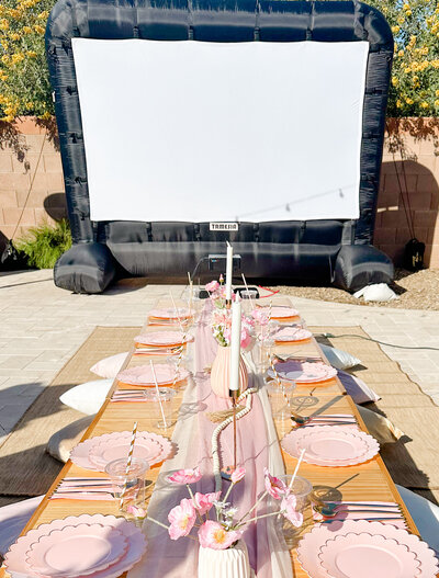 movie screen and projector blow up for a backyard party
