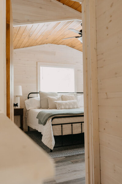 Master bedroom with white coastal decor