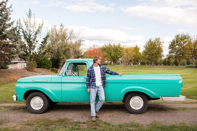 senior guy sitting in jeep