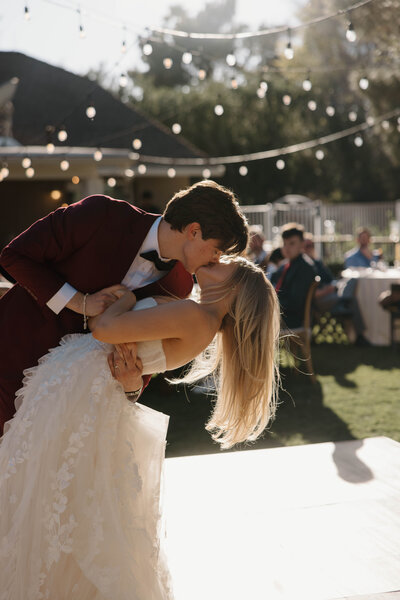 bride holding her wedding dress