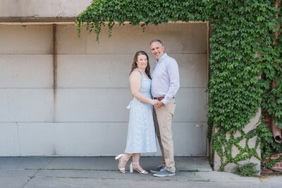 an engaged couple holding hands