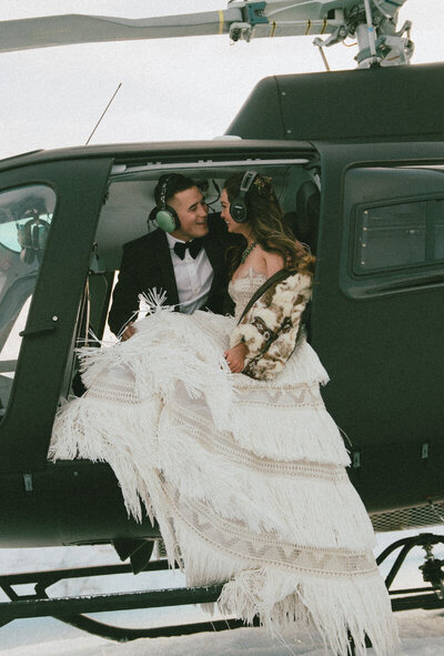 pnw elopement couple in a helicopter captured by their pnw photographer