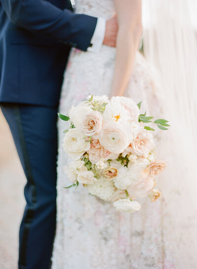 Bride and groom walk up memorial steps at their DC wedding