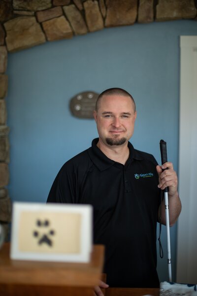 Drew Thurston, founder of Nature's Way Pet Aquamation, standing with compassion and dedication to provide eco-friendly pet afterlife care in Lansing, Michigan.