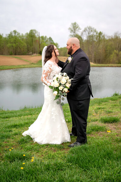 Bride and groom lake wedding ceremony - destination elopement photography
