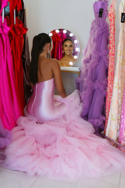 Jovani and Sherri Hill prom dresses on display at Wish Boutique in Fresno, featuring trendy formal gowns perfect for prom, homecoming, and pageants.