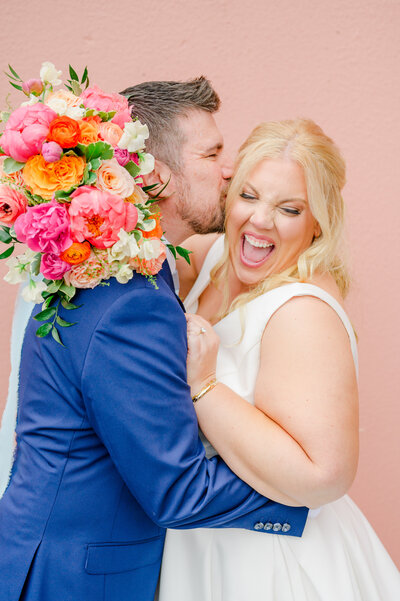 Bride and groom with bouquet on wedding day photographed by Baltimore Wedding Photographer
