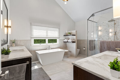 Light white master bathroom with large tub