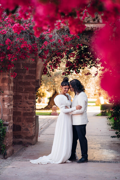 Elopement among the pink florals at Beldi Country Club