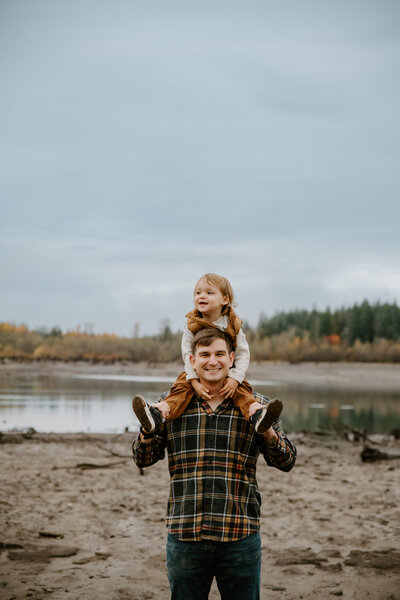 Dad with child on shoulders