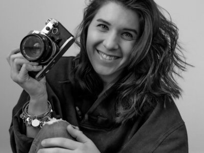 Troy Ohio Family Photographer smiling and holding camera