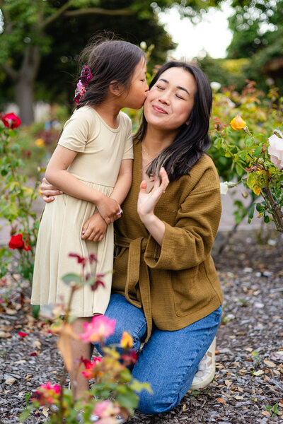 Family of five laughing and snuggling on stone steps in a garden — Bay Area Photographer Services - Ellobelle Photography Family Photographer
