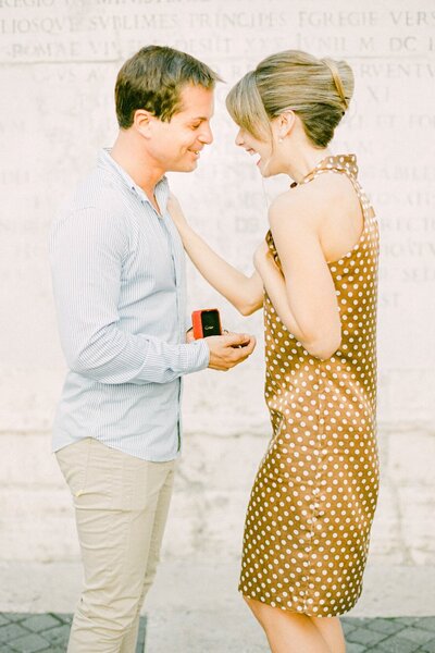Surprise proposal at Rome's Spanish Steps with Cartier ring box
