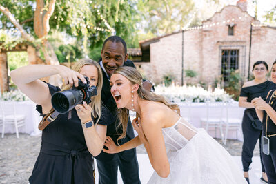 bride and groom stop for a quick pose on the streets of beverly hills