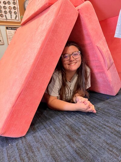Ms. Mia's snapshot photo of her playing in the classroom at the Nest in Surf City, NC