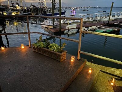 joye luminaries on the dock during heritage days