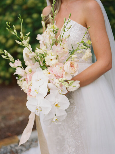 A Nashville bride holding a unique bridal bouquet