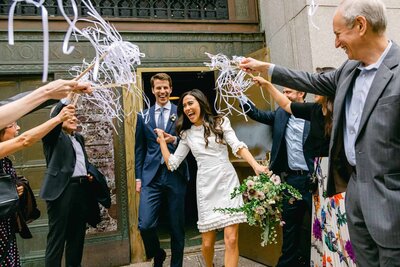 A couple is married in a suite  at the Whitby Hotel in Manhattan