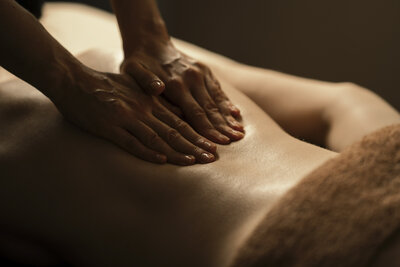 Back massage in low lighting
