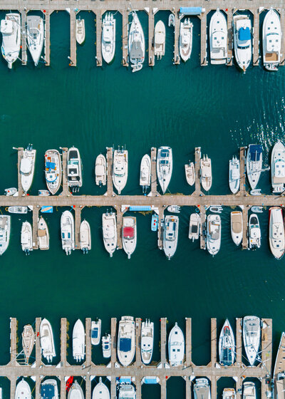 Aerial shot of boats in a marina taken by Candid wedding photographer Maine coast