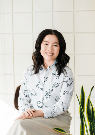 Women's therapist Fresno, Joanne Lai sitting and smiling