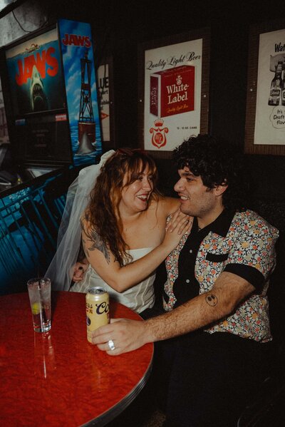 Spring wedding in downtown Iowa City with a Beno's Flowers bouquet