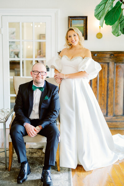 bride standing next to groom